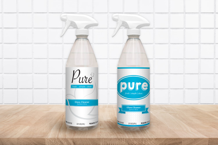Digital 3d mockup of two Pure cleaner spray bottles with iterations of label art.